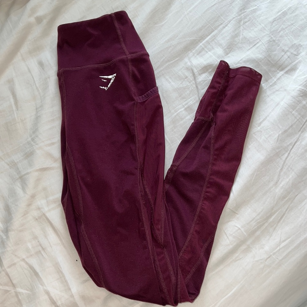 Gymshark xs dark purple leggings with mesh design and pockets on side